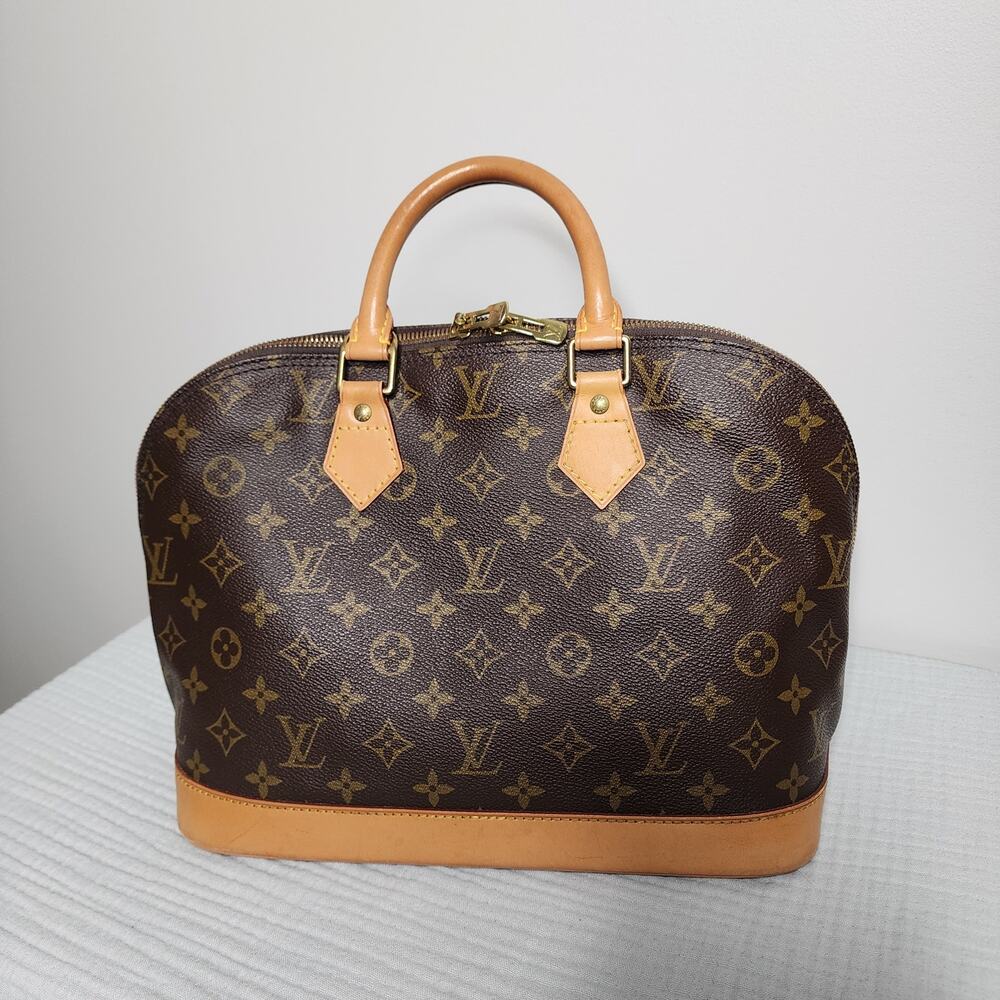 Louis Vuitton Monogram Alma Handbag with COA